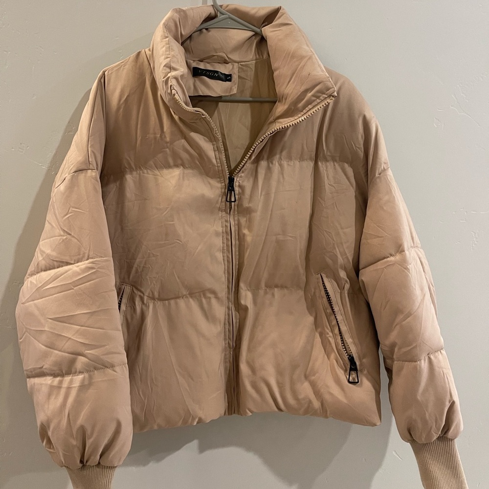 Woman’s puffer coat. VTSGN